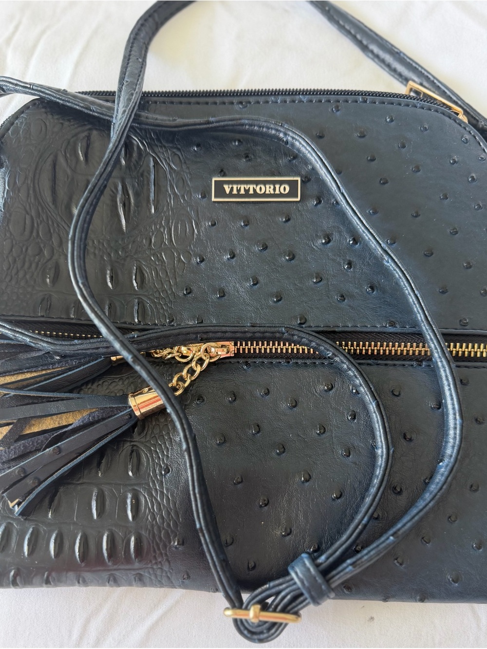 Vittorio Black Textured Crossbody Bag with Tassel and Gold Hardware